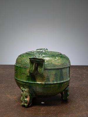 Lot 28 - (R) A GREEN-GLAZED POTTERY DING (TING) WITH COVER, HAN DYNASTY (206 BC–220 AD) CHINA