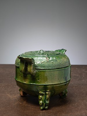 Lot 28 - (R) A GREEN-GLAZED POTTERY DING (TING) WITH COVER, HAN DYNASTY (206 BC–220 AD) CHINA