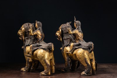 Lot 45 - (R) PAIR OF COPPER REPOUSSE GILT TEMPLE GUARDS ON FO-DOGS SINO-TIBETAN 17TH /18TH CENTURY