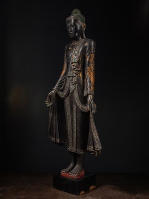 Lot 38 - (R) A LARGE STANDING MANDALAY BUDDHA AS COSMIC HEALER (BHAIṢAJYAGURU) BIRMA 19TH CENTURY