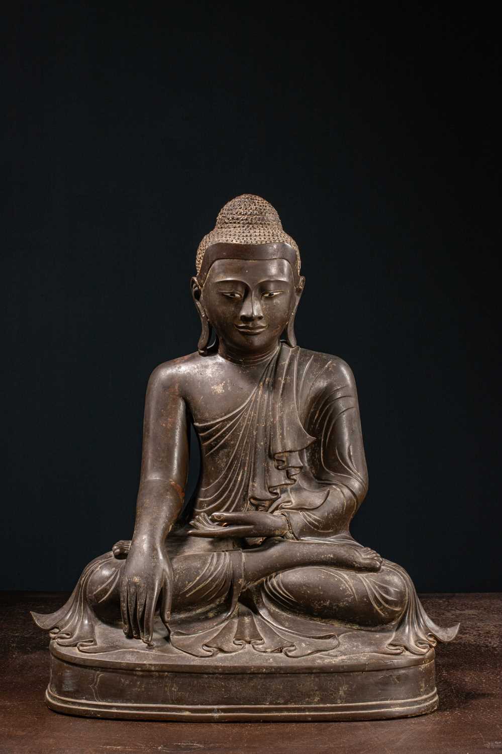 Lot 62 - (R) A BRONZE SEATED MANDALAY BUDDHA , BIRMA 19TH CENTURY