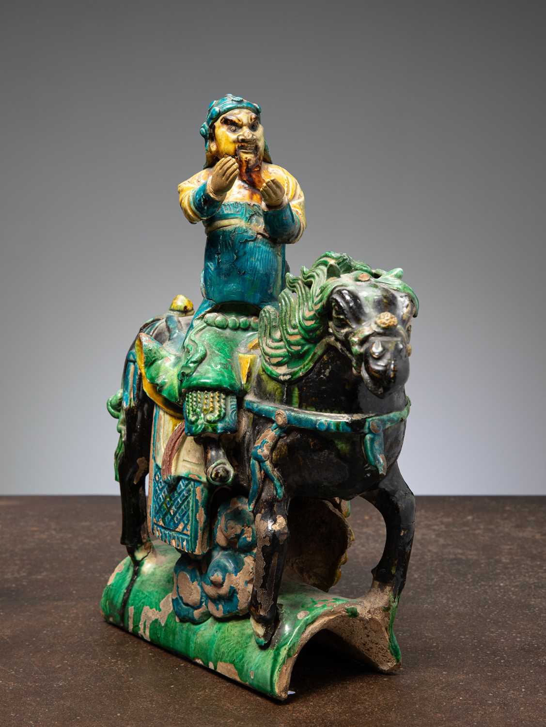 Lot 51 - (R) A CHINESE SANCAI-GLAZED CERAMIC ROOF TOP TILE LATE MING DYNASTY 16TH CENTURY