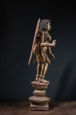 Lot 57 - (R) A LARGE CARVED AND GILT WOOD FIGURE OF AN ANGEL WEST-INDIA GOA ABOUT 1850'S