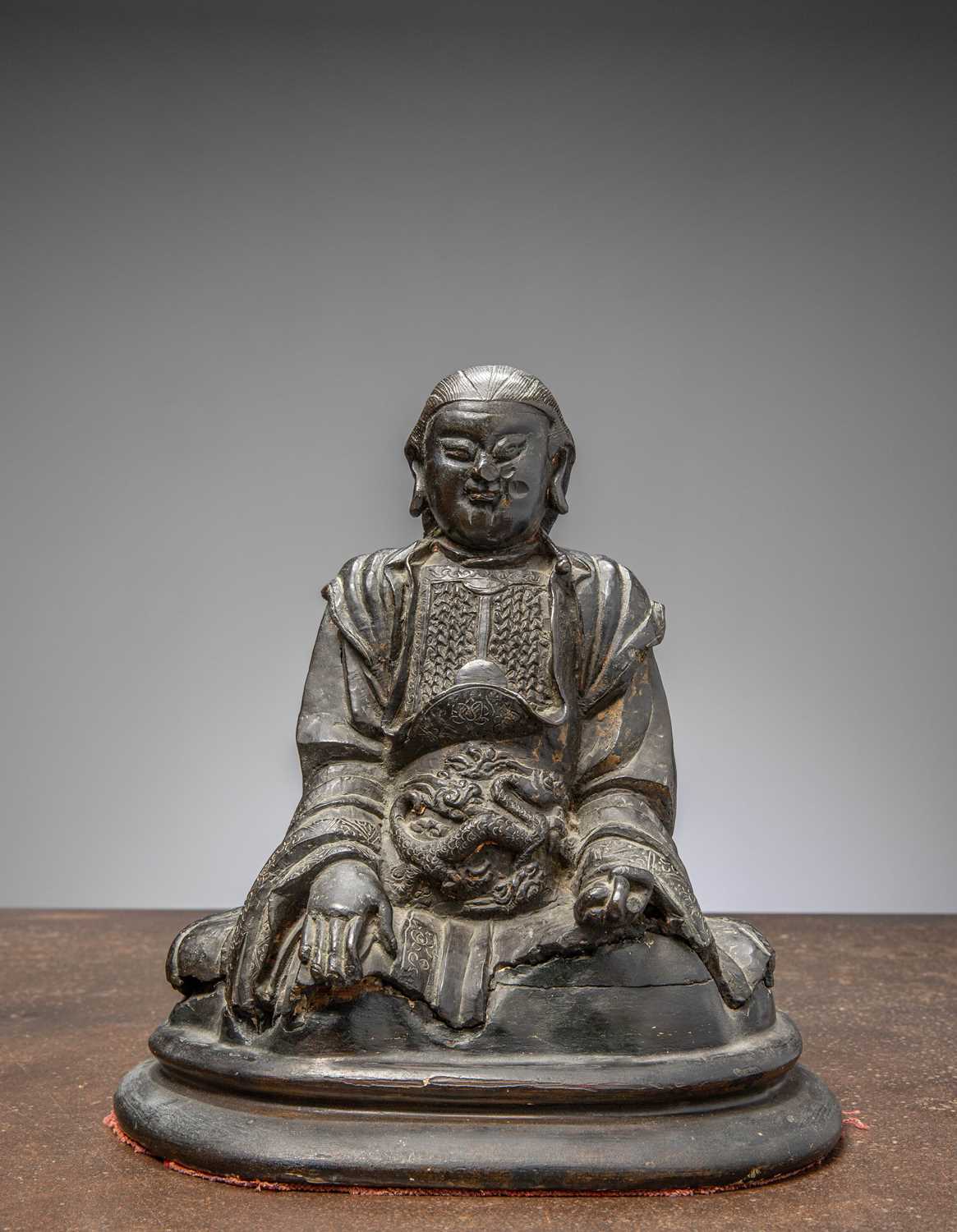 Lot 18 - (R) SEATED BRONZE WARRIOR ZHENWU (CHEN WU) , CHINA MING DYNASTY (1364-1644)