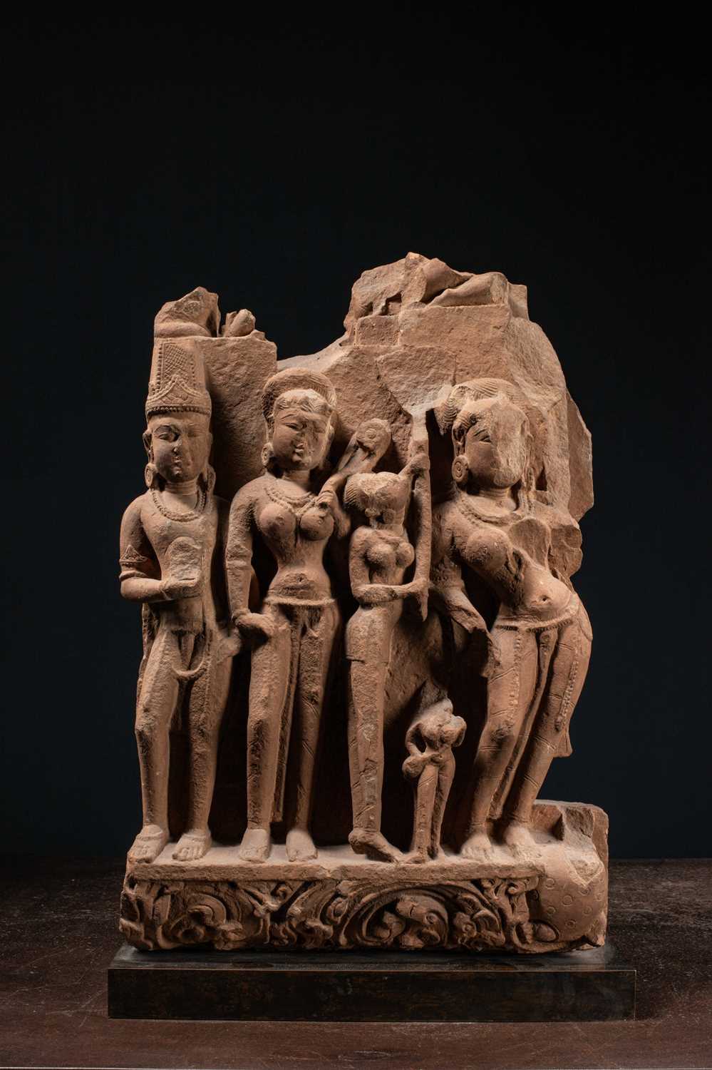 Lot 59 - (R) A SANDSTONE PANEL WITH DIVINE AND FEMALE FIGURES CENTRAL INDIA 11TH CENTUR