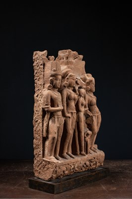 Lot 59 - (R) A SANDSTONE PANEL WITH DIVINE AND FEMALE FIGURES CENTRAL INDIA 11TH CENTUR