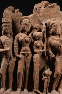 Lot 59 - (R) A SANDSTONE PANEL WITH DIVINE AND FEMALE FIGURES CENTRAL INDIA 11TH CENTUR