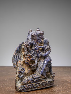 Lot 32 - (R) A RARE LAPIS LAZULI FIGURE OF HEVAJRA IN YAB-YUM TIBET 18TH CENTURY