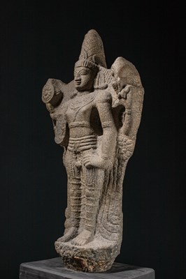 Lot 54 - (R) A FOUR-ARMED STANDING STONE VISHNU INDIA VIJAYANAGAR 15TH / 16TH CENTURY