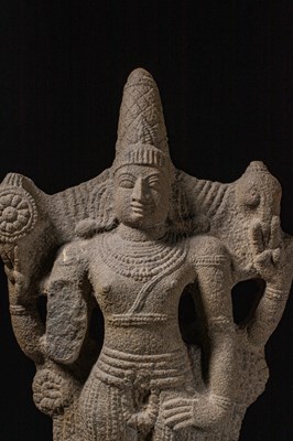 Lot 54 - (R) A FOUR-ARMED STANDING STONE VISHNU INDIA VIJAYANAGAR 15TH / 16TH CENTURY