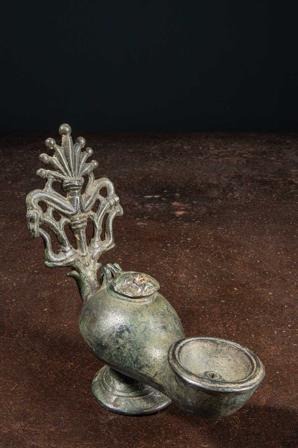 Lot 27 - (R) A RARE ROMAN BRONZE OILLAMP WITH HANDLE PURCHASED IN THAILAND 2nd-3rd AD