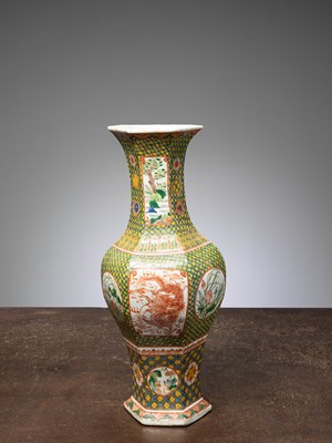 Lot 67 - (R) A LARGE FAMILLE VERTE HEXAGONAL VASE WITH DRAGON AND FLORAL PANELS