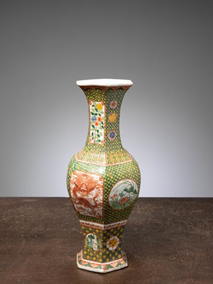 Lot 67 - (R) A LARGE FAMILLE VERTE HEXAGONAL VASE WITH DRAGON AND FLORAL PANELS
