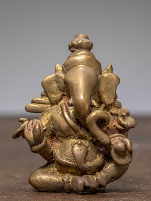 Lot 336 - A SEATED BRONZE GANESHA, INDIA, 19TH CENTURY