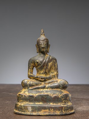 Lot 437 - A SEATED BRONZE RESTGILT BUDDHA THAILAND 15TH CENTURY