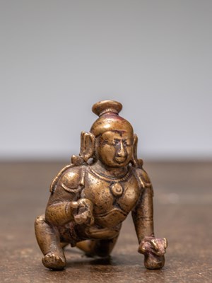 Lot 347 - A BABY KRISHNA, BRONZE, INDIA 15TH CENTURY