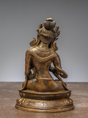 Lot 42 - A SEATED BRONZE TARA WITH REMAINS OF GILDING, CHINA QING DYNASTY