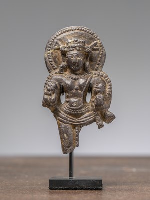 Lot 374 - A STANDING FRAGMENT OF A KASHMIRI STONE VISHNU, 12TH CENTURY