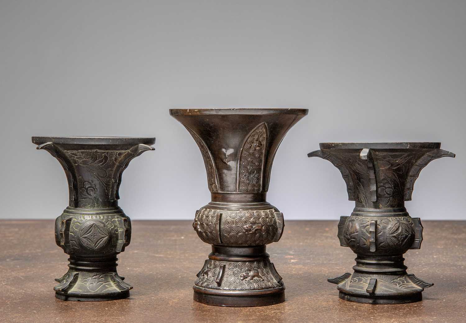 Lot 28 - (R) THREE GU TYPE BRONZE RITUAL VESSELS CHINA 18TH CENTURY