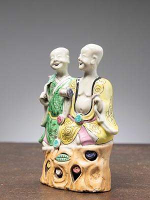 Lot 36 - (R) A PORCELAIN STATUE OF LAUGHING TWINS, LATE CHIEN LUNG PERIOD, CHINA, 1780/1790