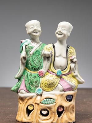Lot 36 - (R) A PORCELAIN STATUE OF LAUGHING TWINS, LATE CHIEN LUNG PERIOD, CHINA, 1780/1790