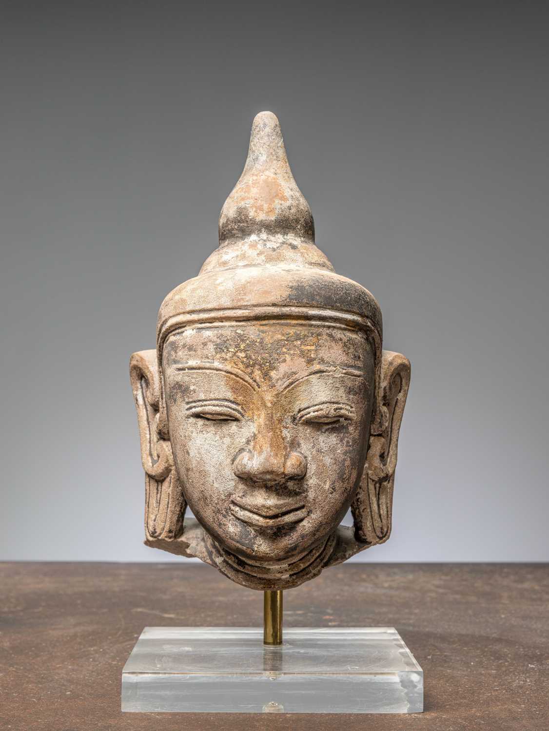 Lot 44 - (R) A HEAD OF A BUDDHA, RED SANDSTONE, BIRMA MANDALAY 1850