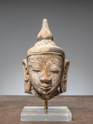Lot 44 - (R) A HEAD OF A BUDDHA, RED SANDSTONE, BIRMA MANDALAY 1850