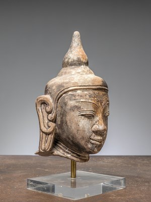 Lot 44 - (R) A HEAD OF A BUDDHA, RED SANDSTONE, BIRMA MANDALAY 1850