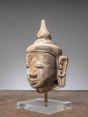 Lot 44 - (R) A HEAD OF A BUDDHA, RED SANDSTONE, BIRMA MANDALAY 1850