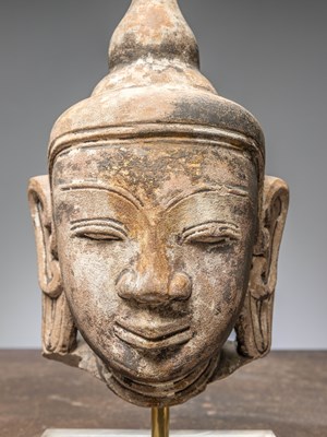 Lot 44 - (R) A HEAD OF A BUDDHA, RED SANDSTONE, BIRMA MANDALAY 1850