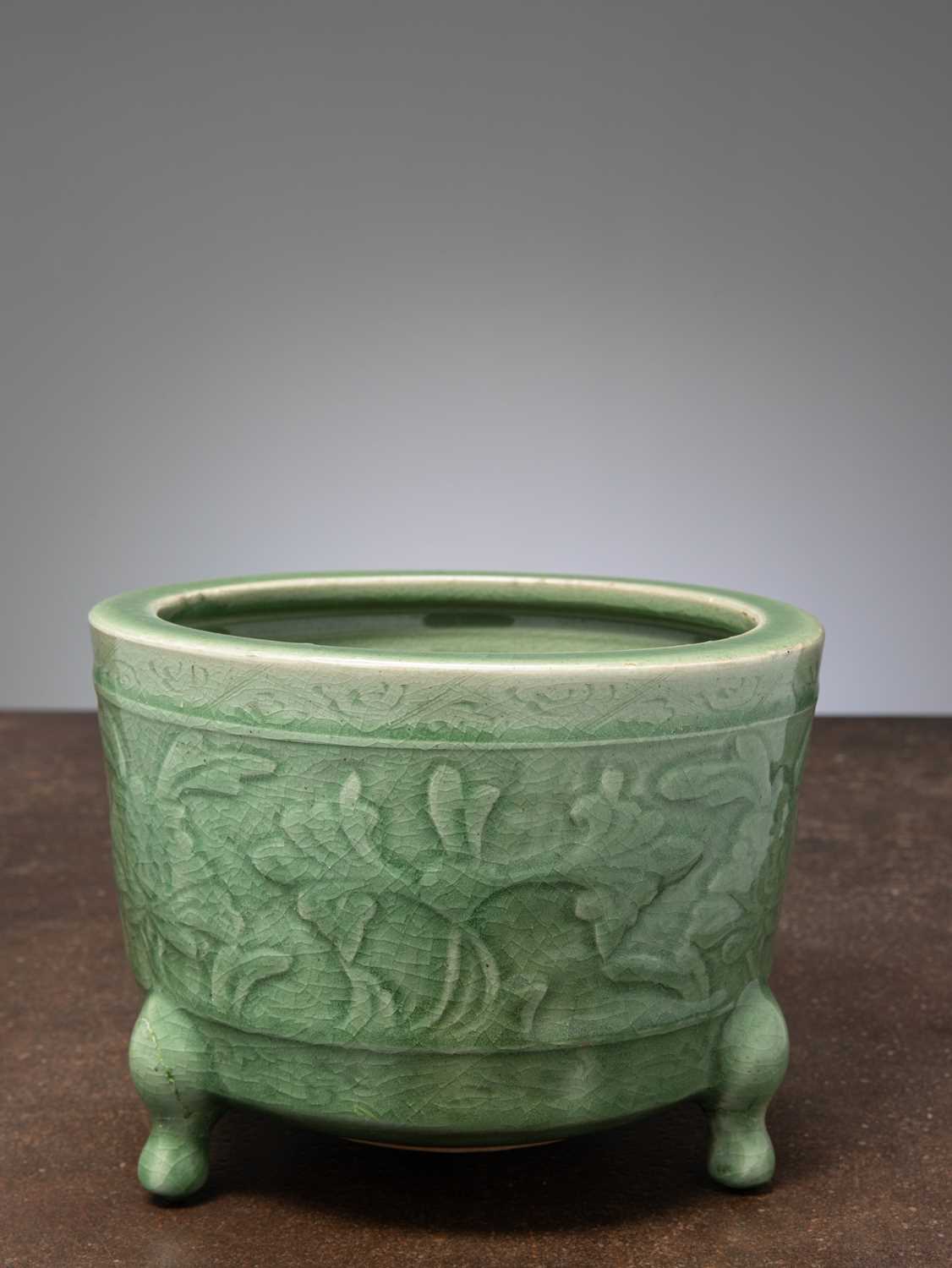 Lot 11 - (R) A CELADON-GLAZED CACHEPOT, FLOWER BASIN, CHINA, EARLY MING DYNASTY