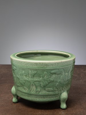 Lot 11 - (R) A CELADON-GLAZED CACHEPOT, FLOWER BASIN, CHINA, EARLY MING DYNASTY