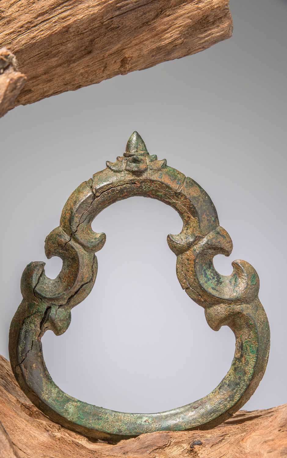 Lot 89 - (R) A BRONZE SEDAN CHAIR HANDLE, KHMER EMPIRE, ANGKOR WAT PERIOD, 12TH CENTURY