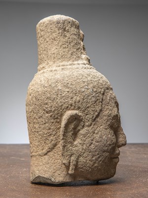 Lot 14 - (R) AN EXQUISITE KHMER SANDSTONE BUDDHIST HEAD, CAMBODIA, 12TH CENTURY
