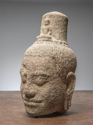 Lot 14 - (R) AN EXQUISITE KHMER SANDSTONE BUDDHIST HEAD, CAMBODIA, 12TH CENTURY