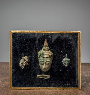 Lot 37 - (R) A COMPOSITION OF BRONZE BUDDHA HEADS AND HAND, THAILAND, AYUTTHAYA PERIOD