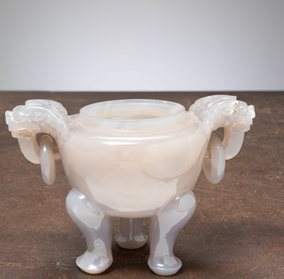 Lot 151 - (R) AN AGATE DING VESSEL, CARVED WITH DRAGON HANDLES, CHINA, ABOUT 1850