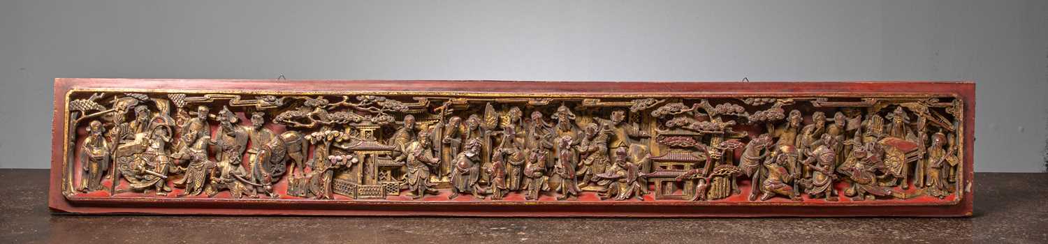 Lot 5 - (R) A CARVED AND GILT WOOD RELIEF PANEL WITH FIGURAL SCENE, CHINA, CIRCA 1850