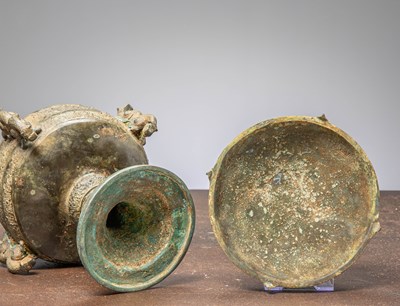 Lot 83 - (R) A CHINESE BRONZE COVERED DOU RITUAL VESSEL ON STEM, EASTERN ZHOU STYLE, 19TH CENTURY