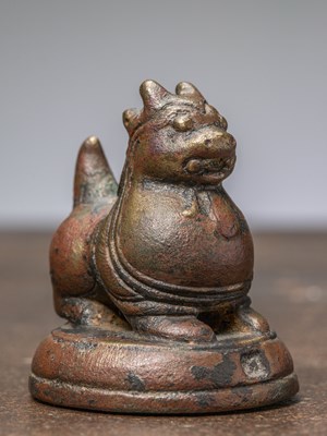 Lot 416 - A BRONZE OPIUM WEIGHT IN LION SHAPE, BURMA, 17TH CENTURY