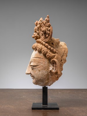 Lot 3 - A HEAD OF A BODHISATTVA, TERRACOTTA WITH POLYCHROME, PAKISTAN, HUND REGION, 5TH–7TH CENTURY