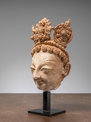 Lot 3 - A HEAD OF A BODHISATTVA, TERRACOTTA WITH POLYCHROME, PAKISTAN, HUND REGION, 5TH–7TH CENTURY