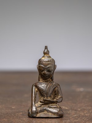 Lot 379 - A SMALL SEATED BRONZE BUDDHA, 12TH CENTURY, BURMA