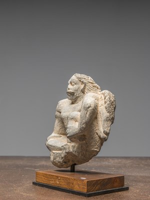 Lot 2 - A GREY SCHIST GANDHARA STATUE DEPICTING AN ATLAS AFGHANISTAN $TH CENTURY