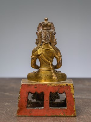 Lot 27 - A SEATED FIREGILT BRONZE STATUE OF AMITAYUS CHINA 18TH CENTURY QING DYNASTY