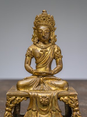 Lot 27 - A SEATED FIREGILT BRONZE STATUE OF AMITAYUS CHINA 18TH CENTURY QING DYNASTY