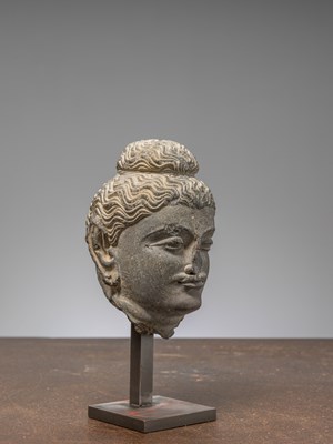 Lot 1 - A GREY SCHIST HEAD OF BUDDHA GANDHARA 4TH CENTURY