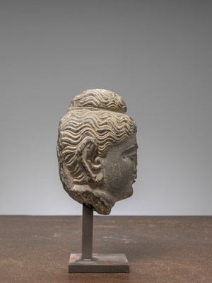 Lot 1 - A GREY SCHIST HEAD OF BUDDHA GANDHARA 4TH CENTURY