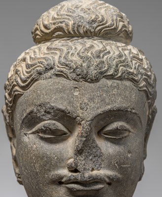 Lot 1 - A GREY SCHIST HEAD OF BUDDHA GANDHARA 4TH CENTURY