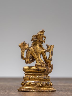 Lot 35 - A GILT-BRONZE FIGURE OF GREEN TARA, TIBET, 18TH CENTURY